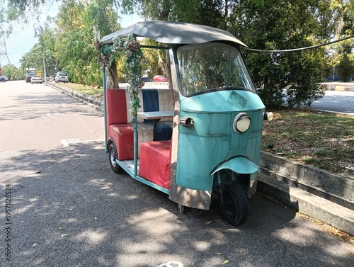 Tuk tuk is a taxi that is used to transport passengers turned into eating cart or utility. photo taken in malaysia    