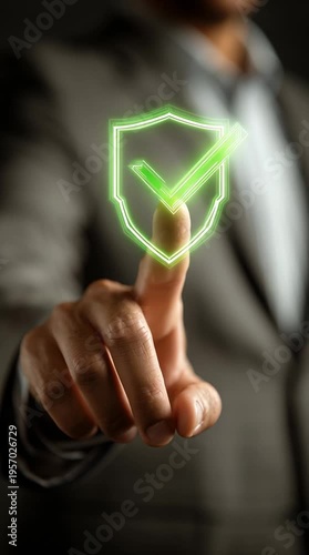 Businessman Touching Glowing Green Shield with Checkmark Icon for Cyber Security, Data Protection, and Insurance Approval Concept