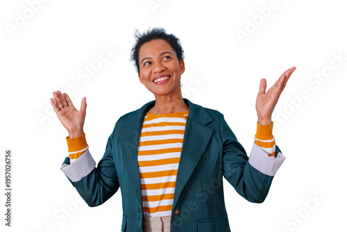 Fotografie Cheerful woman expressing happiness with a wide smile, raising hands in celebration