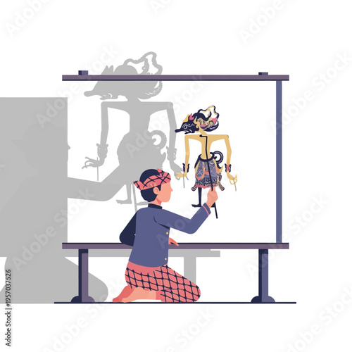 Indonesian boy performing traditional Wayang Kulit shadow puppet show with illuminated screen