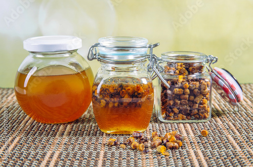 Cuadro en lienzo Alternative medicine mixture made with honey and bee bread ( fermented flower and plant pollen by honey bees) inside small glass jar indoors