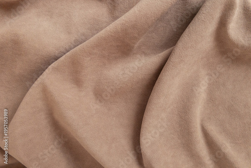 Valokuva High-quality close-up of soft brown velour or faux suede fabric