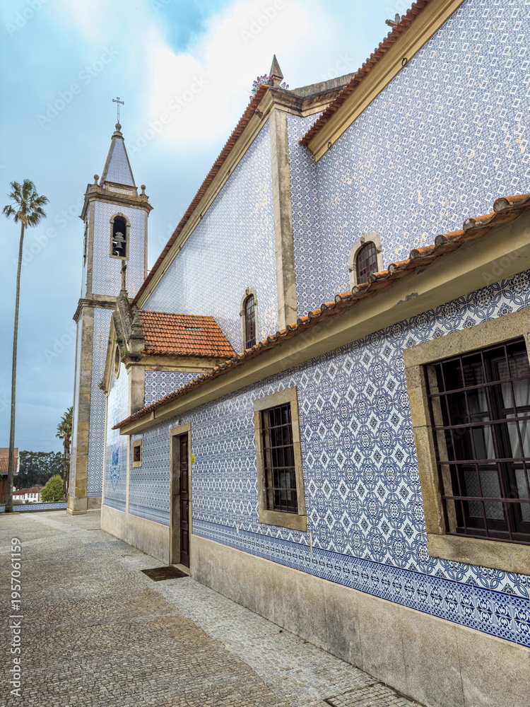 Fototapeta premium Igreja de Santa Marinha de Cortegaca, church decorated with blue and white azulejos in Cortegaca, Portugal.