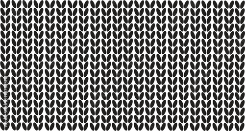 Dark knitted fabric texture with detailed interweaving, forming a deep monochrome patterned background, perfect for sophisticated design applications