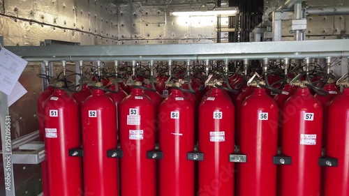Red oxygen cylinders installed on the ship.
