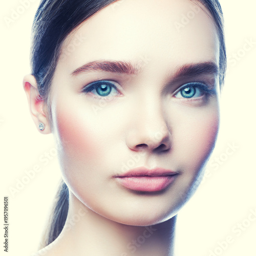 beauty model girl with clean skin and natural nude make-up. Skincare facial treatment concept