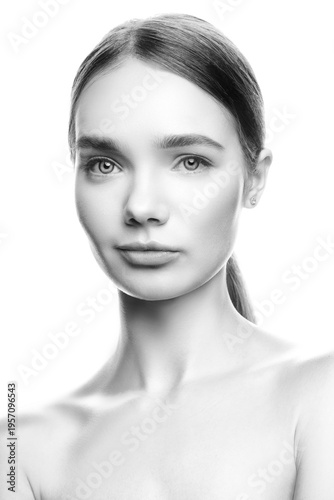 beautiful young model woman isolated on white background. Nude makeup. Monochrome