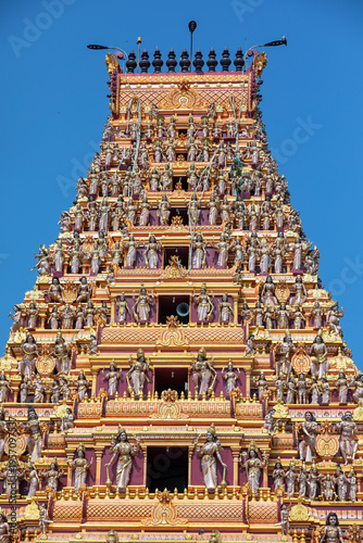 A section of the gopuram of the Naga Pooshani Ambal Kovil on Nainativu Island in the Jaffna region of Sri Lanka. The temple is dedicated to the Hindu goddess Ambal.