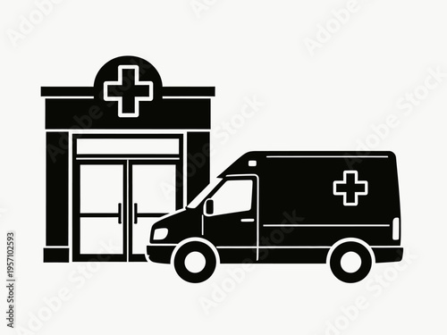 An ambulance is parked outside a medical building at night