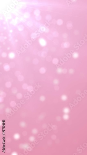Bokeh Particles Pink Background Loop. 10 seconds loop animation of shiny particles with blue background, vertical resolution.
