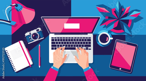 Person typing on laptop at desk with tablet and coffee