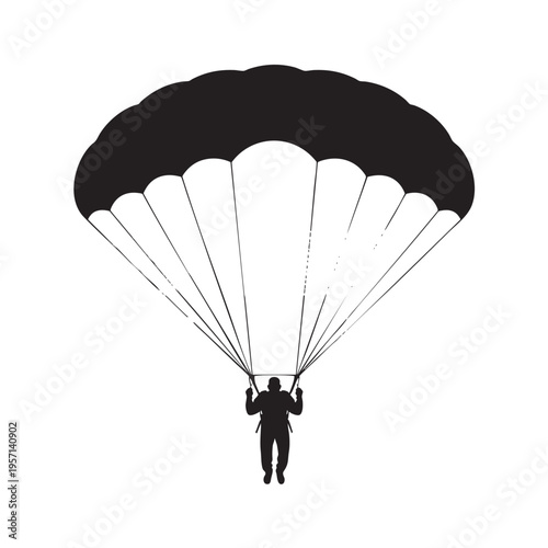 Parachuter silhouette in dramatic dark monochrome for adventure travel