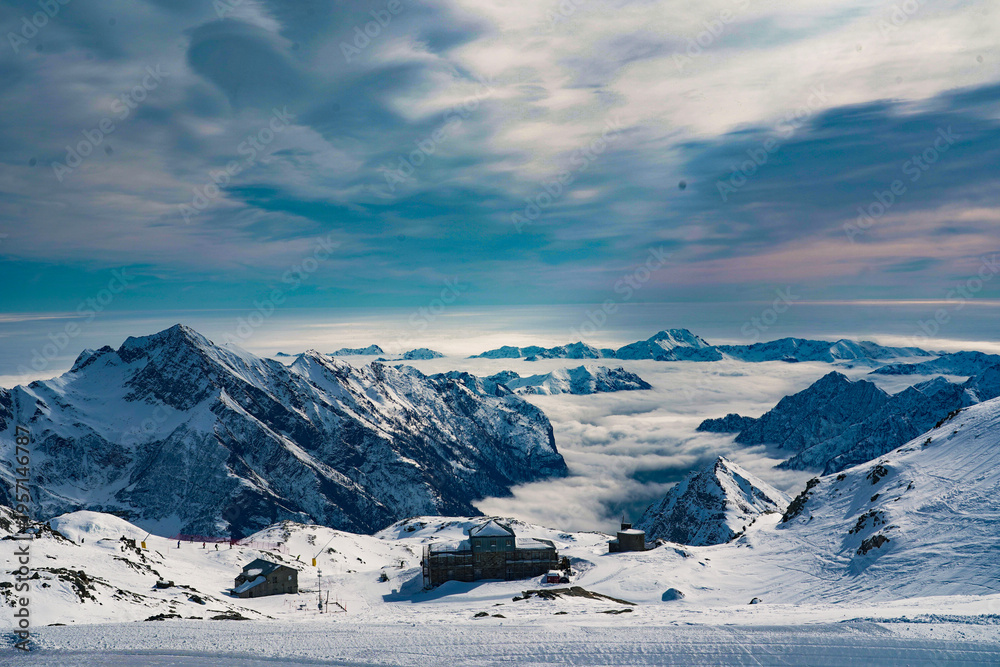 Obraz premium Beautiful Dolomites Landscape with Clouds Rolling Through Valley