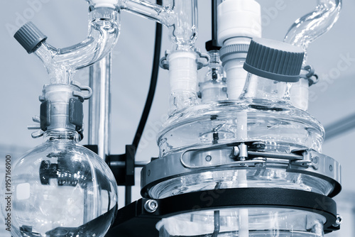 Tableau sur toile Glass lab equipment gleams under bright light