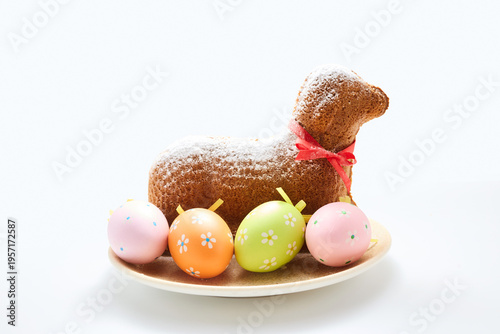 Easter lamb cake with colorful decorative eggs