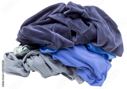 A collection of wrinkled clothes sits in a messy pile, showing various colors and fabrics. This scene suggests it is time for sorting and washing the laundry