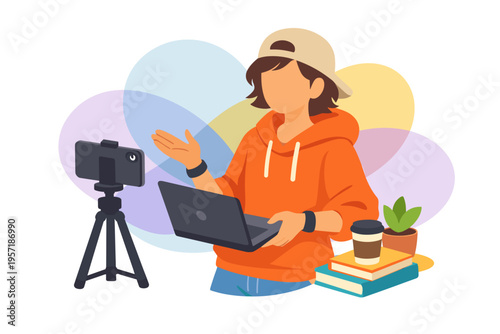 Young woman creating content with laptop and camera.