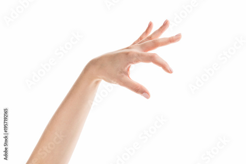 Young woman hand holding something with fingers from the top isolated on white background