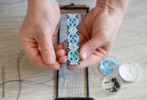 Canvas Print Woman using beading loom frame tool to make seed bead bracelet at home