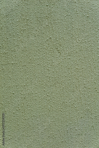 Light green stucco wall rough texture background