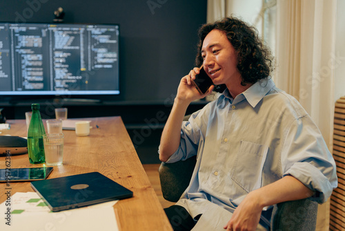 Confident Female Manager Efficiently Discussing Contractual Terms In Contemporary Office Setting