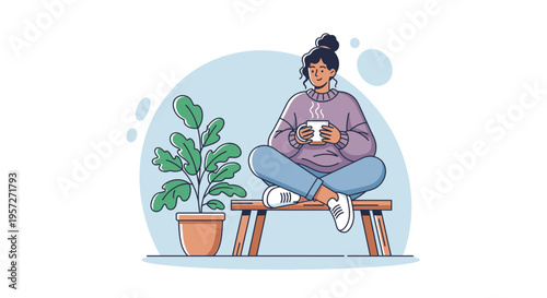 Woman sitting with a coffee cup.