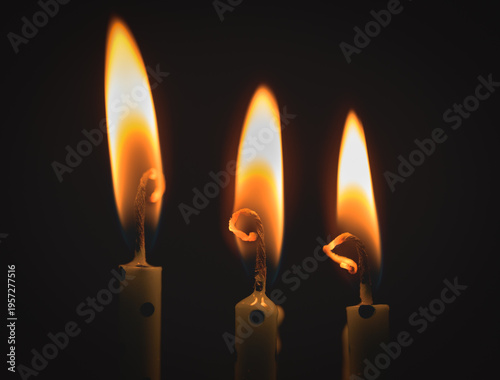 burning candle in the dark
