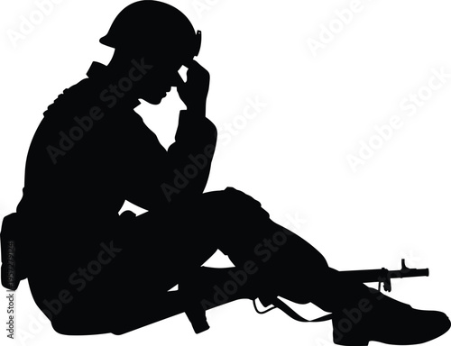 Silhouette of a man sitting at a desk with computer monitor working in office or home environment for ergonomic concept