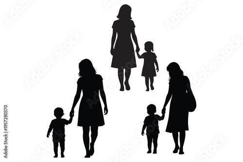 Silhouette of three generations of family walking together