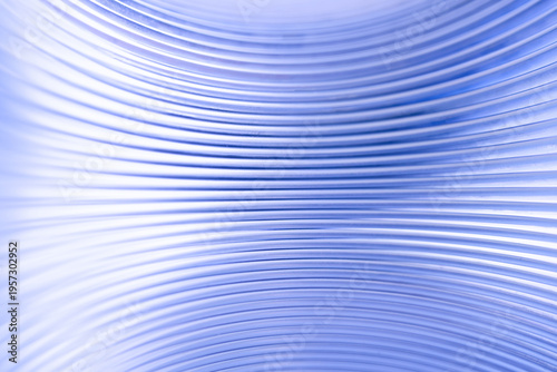 Modern blue abstract texture with repeating curved lines creating depth and perspective. Trendy high‑resolution backdrop for technology, industry, research or corporate design. Photo