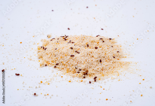 Cigarette beetle (Lasioderma serricorne) infesting breadcrumbs as a stored food pest, Sagunto, Valencia, Spain.