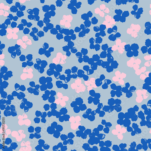 A seamless vector pattern with tiny hand-painted floral blooms in cobalt blue and soft pink on a pale sky-blue 