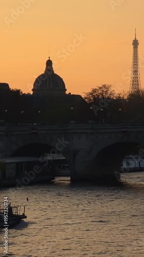 Sunset Over Seine River and Historic Bridge in Paris, France