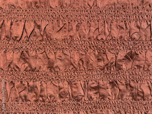 Bild auf Leinwand Pleated elastic fabric sewn in shirring with ruffles applied at waistbands or skirts, and in woman clothes