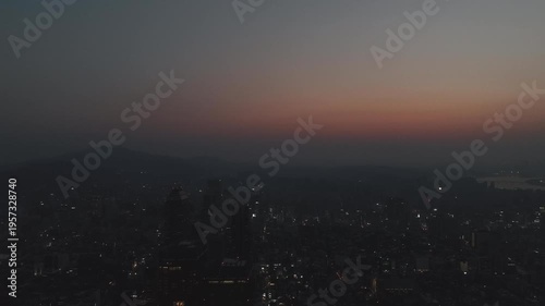 Aerial view of the glowing skyscrapers and busy city lights at night in Teheran-ro, Gangnam, Seoul, South Korea.