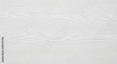 A white wood panel displays a textured pattern resembling wood grain. The surface shows subtle wavy lines and variations in color, creating a natural and organic appearance.