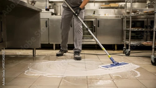 Wallpaper Mural Medium shot of a worker using a highalkaline sanitizer floor cleaner in a commercial kitchen emphasizing hygienic sanitation and safety protocols. Torontodigital.ca