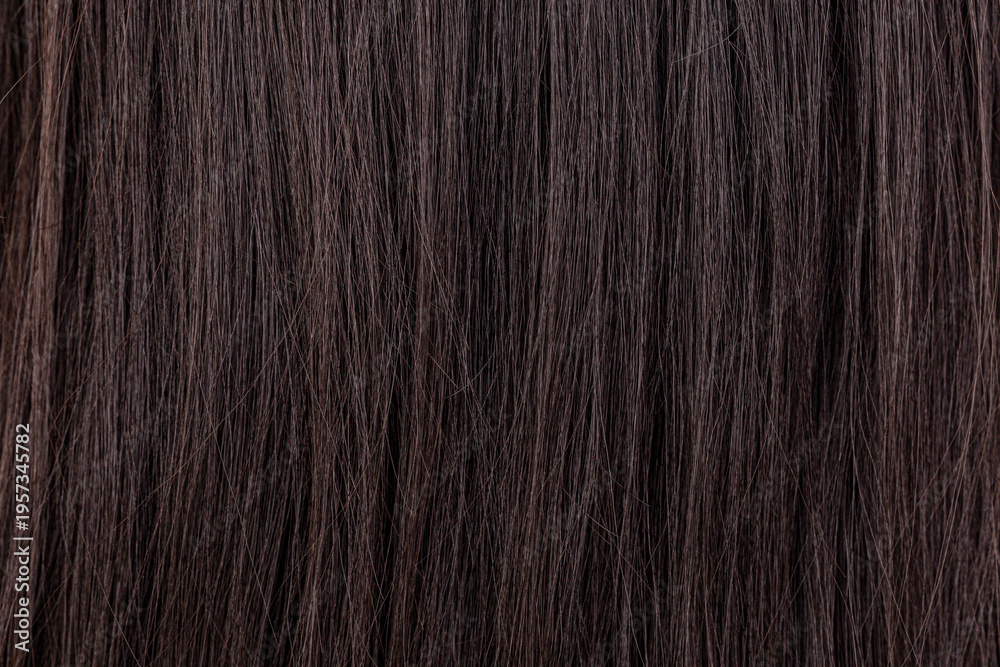 Naklejka premium Long straight dark hair texture background