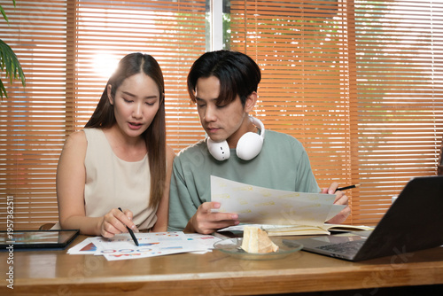 A young Asian couple spend time together at home