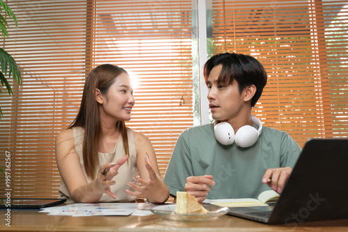 A young Asian couple spend time together at home