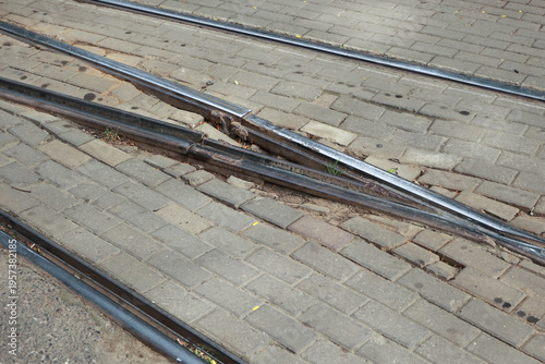 Tableau sur toile Rusty tram rails embedded in a cobblestone street