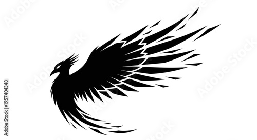 Black silhouette of a flying bird with outstretched wings