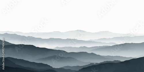 A serene misty mountain landscape at dawn features a silhouette of forest trees over a blue valley as clouds and fog drift across the peak during a winter sunrise.