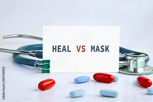 Photos A professional stethoscope and a scattering of bright medical capsules frame a p