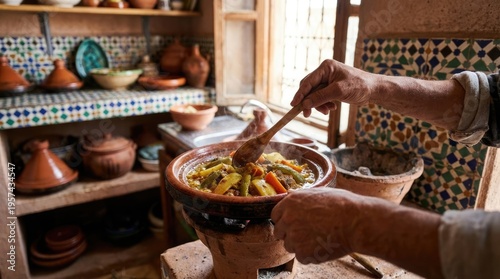Hands stirring a steaming tagine stew on a traditional Moroccan stove
