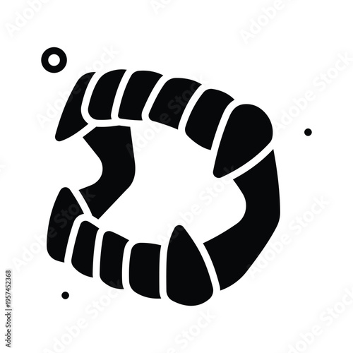 A modern glyph icon showing vampire teeth halloween prank