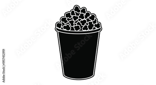 A black and white illustration of a full bucket of popcorn
