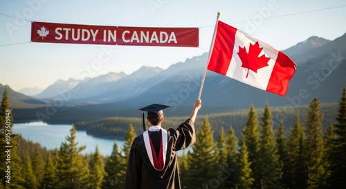 Male student in academic dress holding a Canadian flag facing a study in Canada sign, planning a successful future abroad.