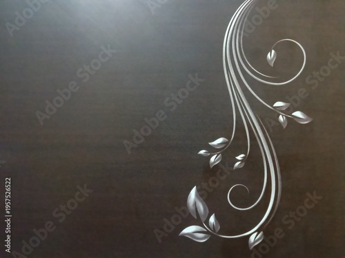 Elegant Silver Floral Swirl Design with Leaves on Dark Brown Textured Background