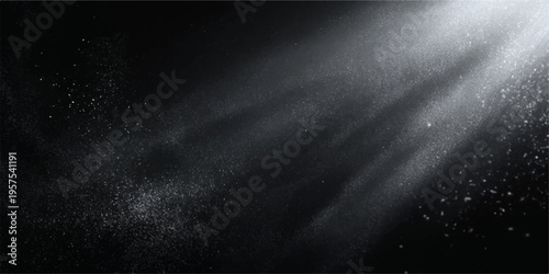 A dark stormy night sky filled with blue clouds and mist creates a textured backdrop where rain drops on the window catch the light amidst a flash of lightning